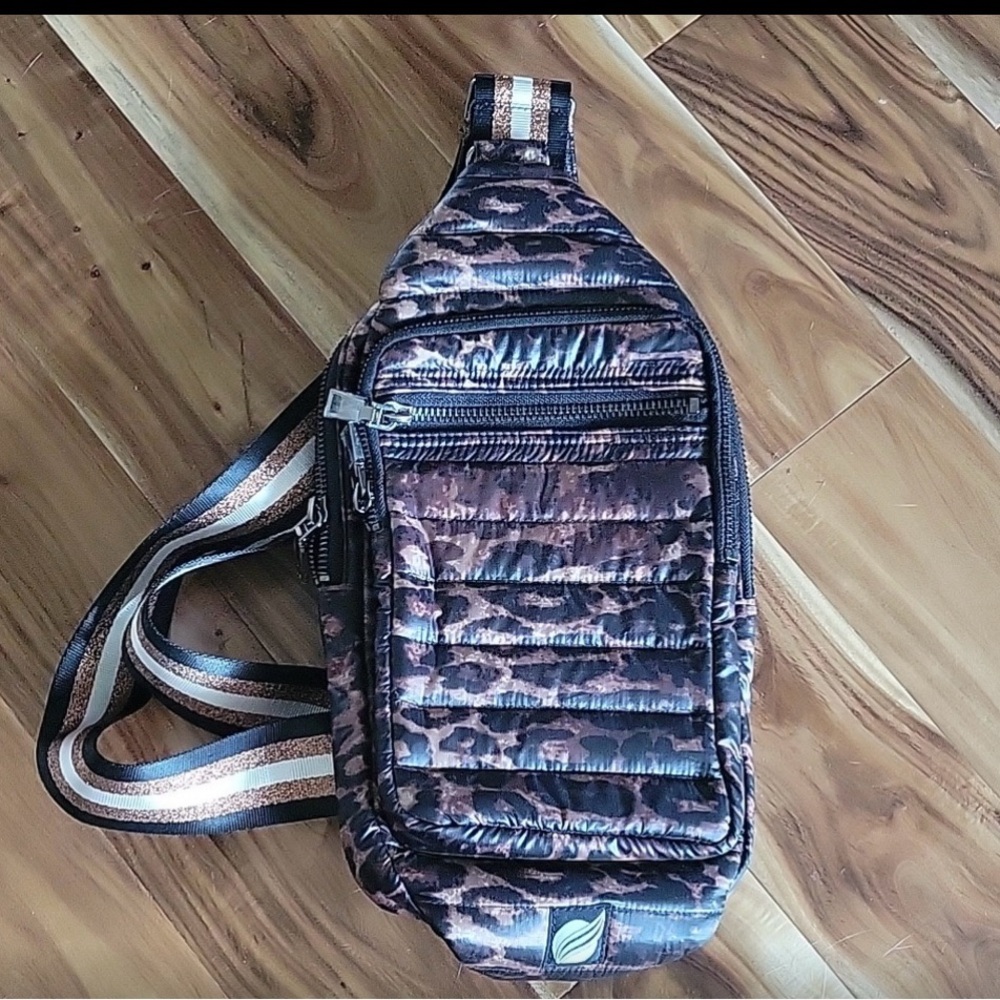 large cross body sling 
THINK ROLYN 
NWT